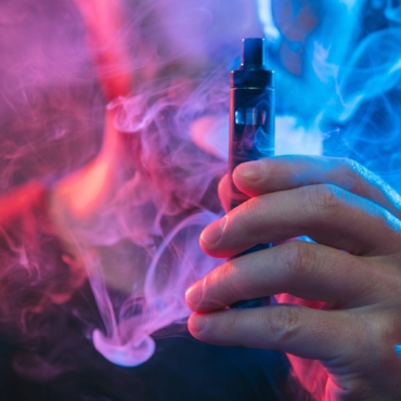 Vaping flavored e-liquid from an electronic cigarette